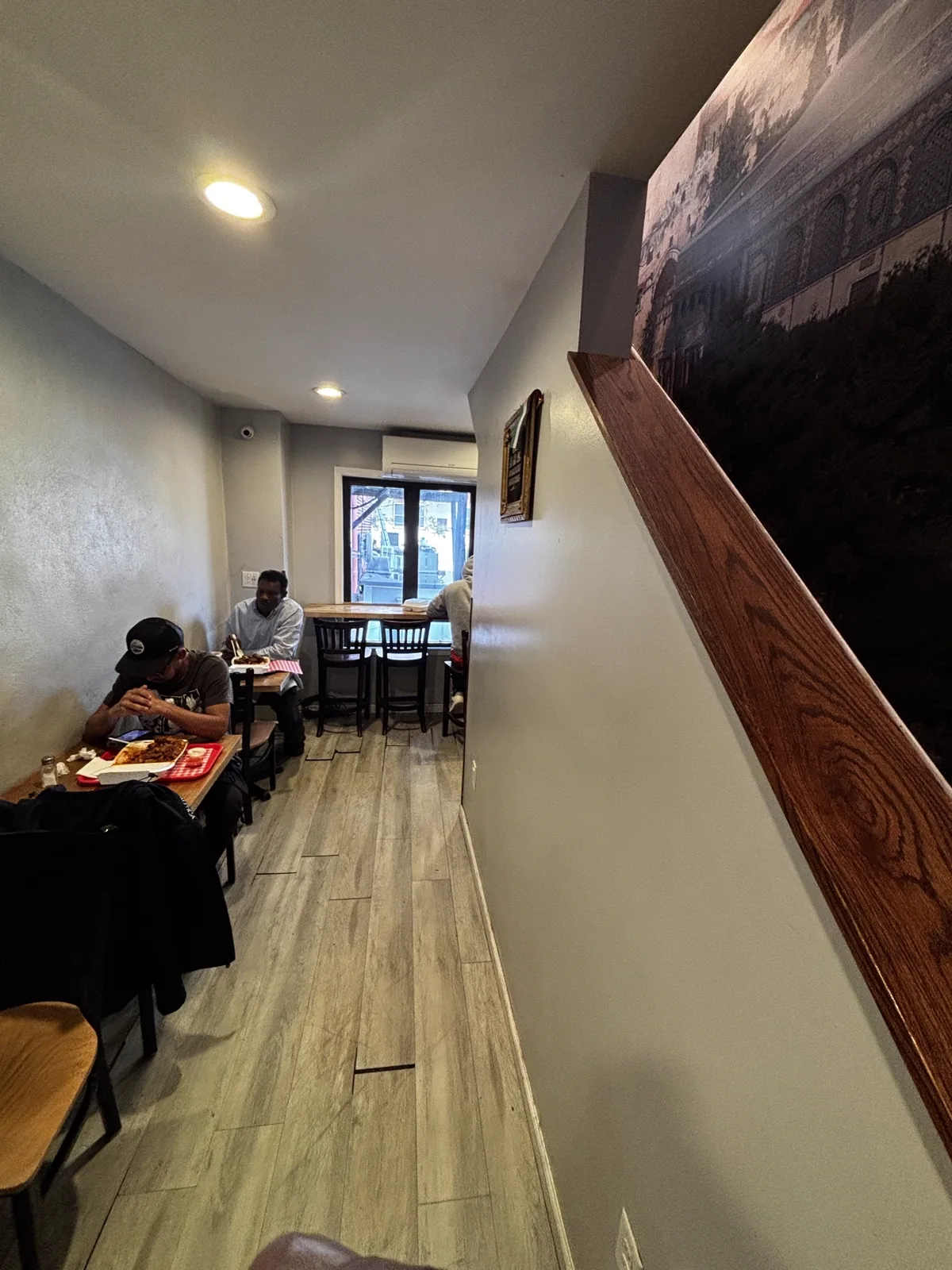 Customers eating at the Makkah Market café